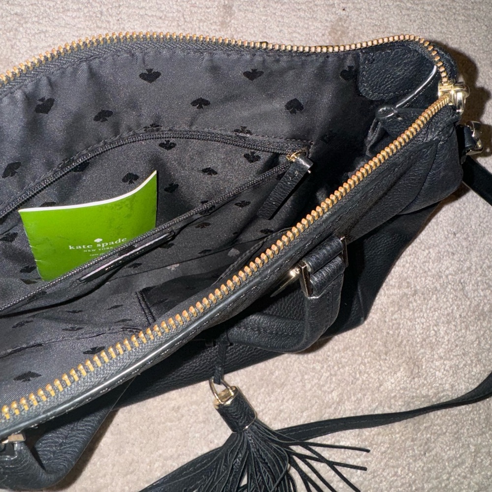 Kate spade large crossbody with tassel attached